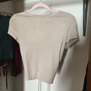 Tan crop with open back